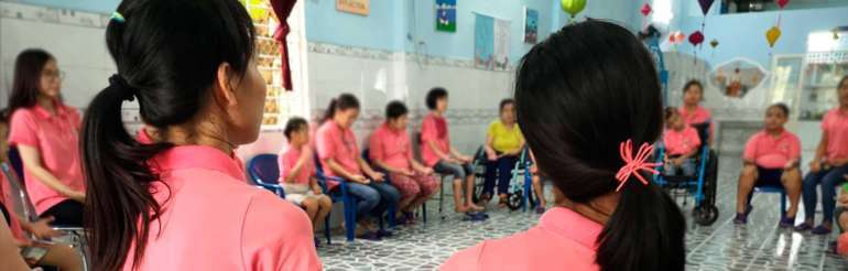 Group of young students with disabilities.